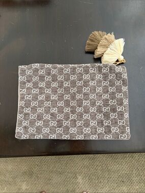 Repurposed designer pouch
